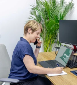A business broker on the phone discussing a business appraisal